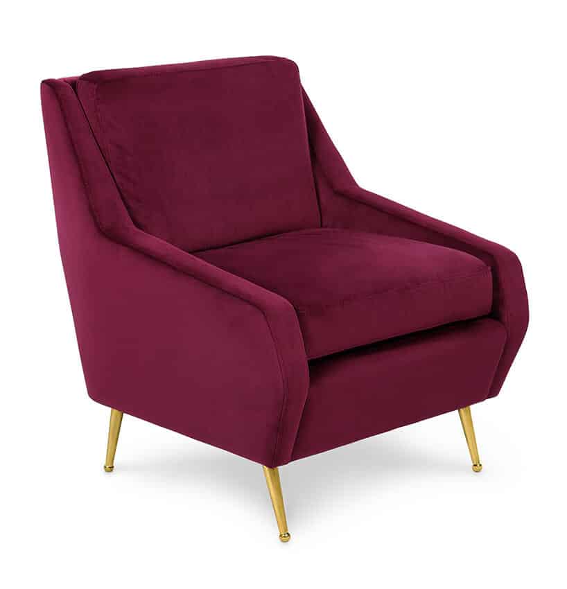 modernistyczne wnętrze Ravenswood Residence elegancki bordowy fotel ze złotymi nogami
