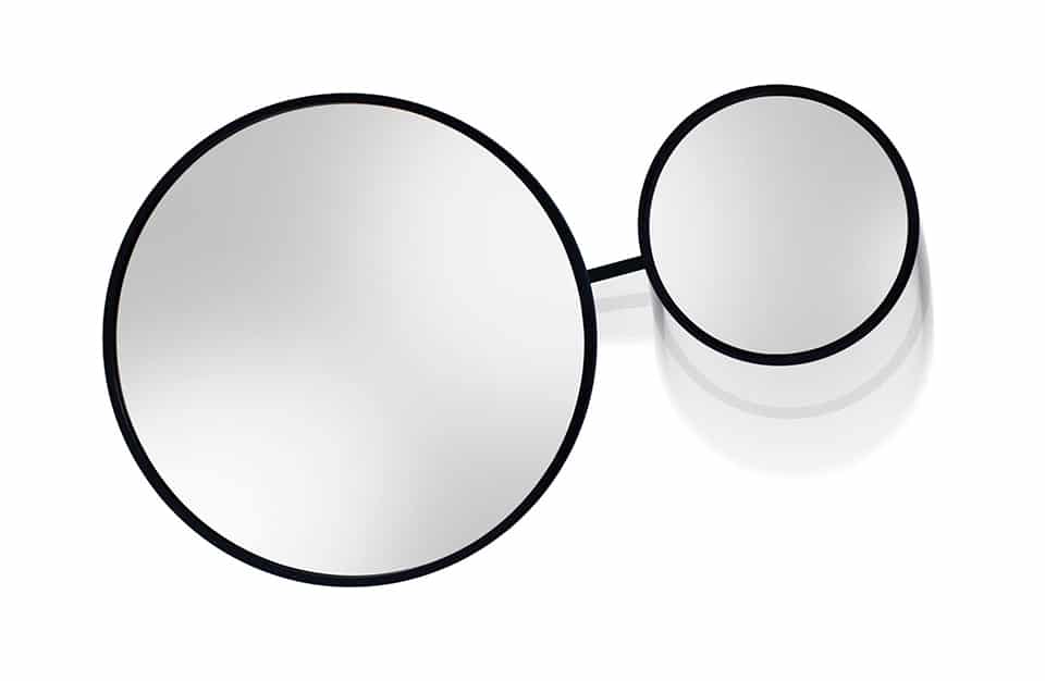 dwa połączone lustra okrągłe o różnej wielkości w czarnej ramce
